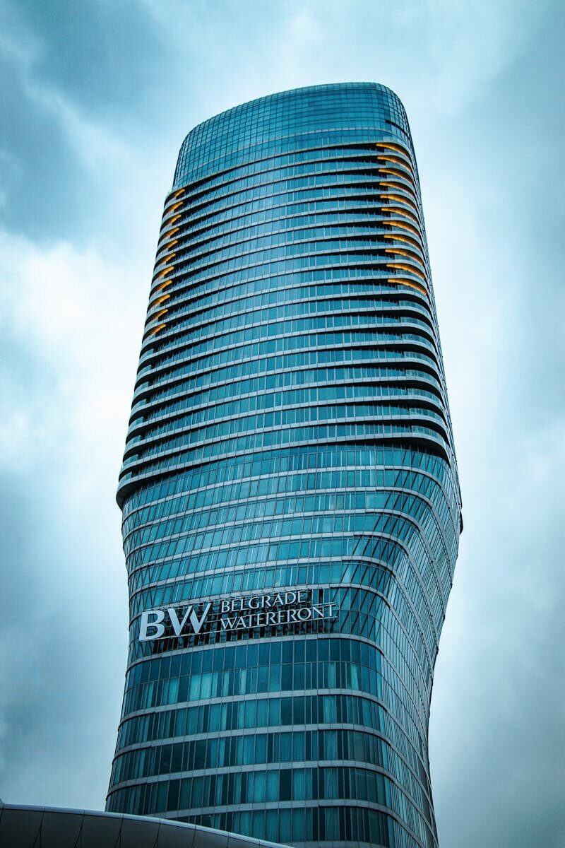 Stunning view of the Belgrade Waterfront Tower against a dramatic sky in Serbia.