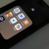A close up of a cell phone on a table