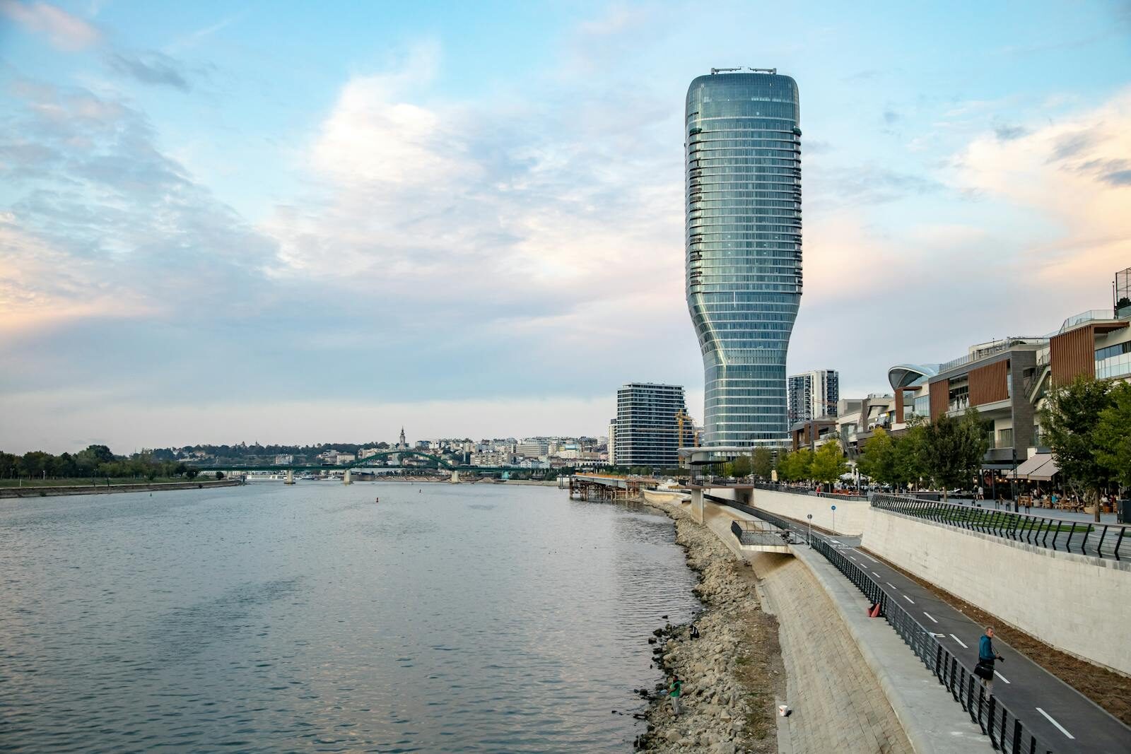 A stunning view of Belgrade Tower by the Danube River at dusk in Serbia.