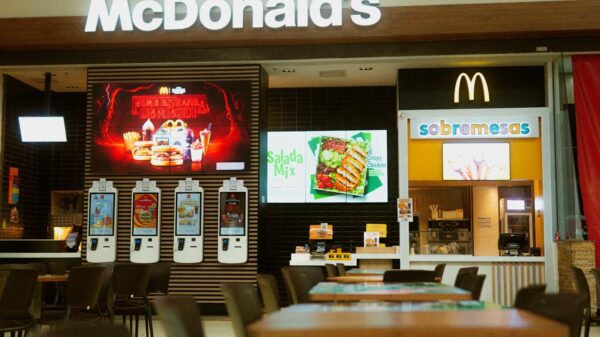 McDonald's fast food restaurant featuring self-service kiosks and digital menus.