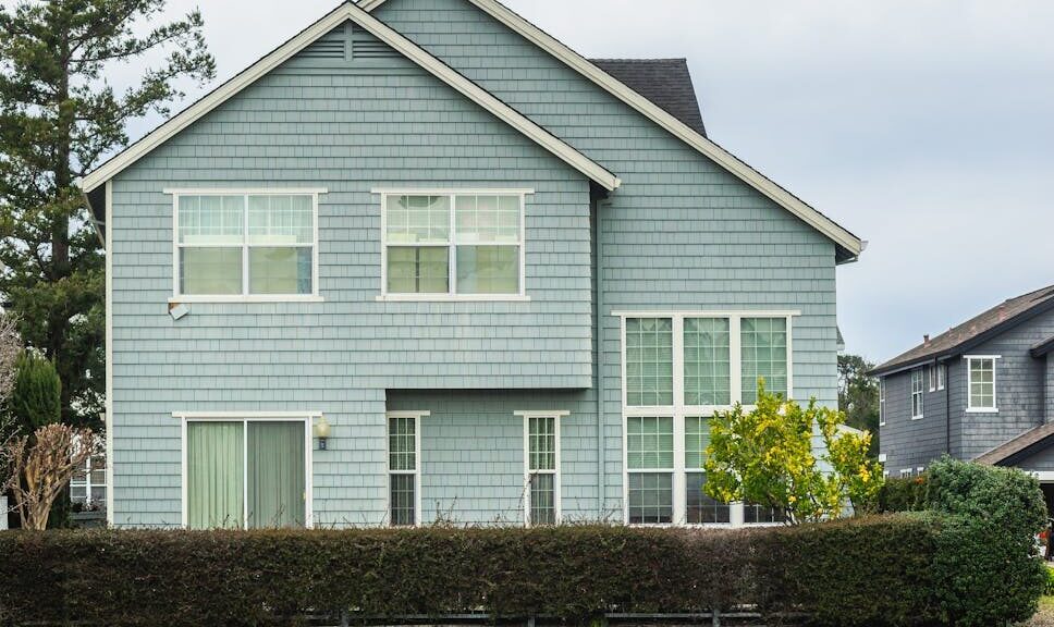 A contemporary detached house in a suburban neighborhood with a scenic canal front.