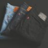 three assorted-color denim bottoms