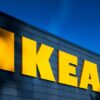 a yellow ikea sign on the side of a building