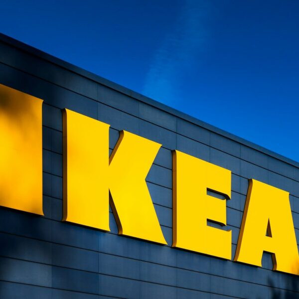 a yellow ikea sign on the side of a building