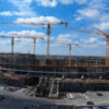 A drone shot of the National Stadium of Serbia in Surcin, which is the central part of the EXPO 2027 complex, has entered the most visible phase of construction. Snimak iz drona Nacionalnog stadiona Srbije u Surcinu koji predstavlja centralni deo EXPO 2027 kompleksa usao je u najvidljiviju fazu izgradnje.