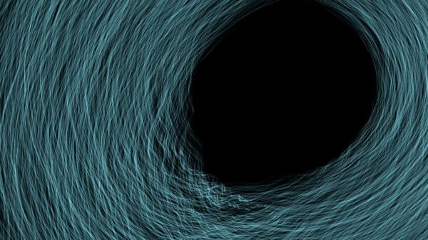 Swirling abstract light painting creating a tunnel-like effect with vibrant colors.