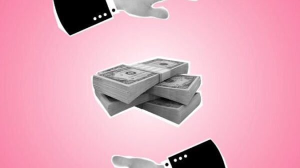 Creative cut out paper composition of hands around pile of dollar banknotes for credit on pink background