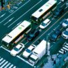 Aerial photograph capturing a busy city intersection filled with buses and cars, showcasing urban traffic.