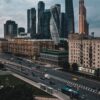 View of Moscow's modern skyscrapers and busy urban streets.