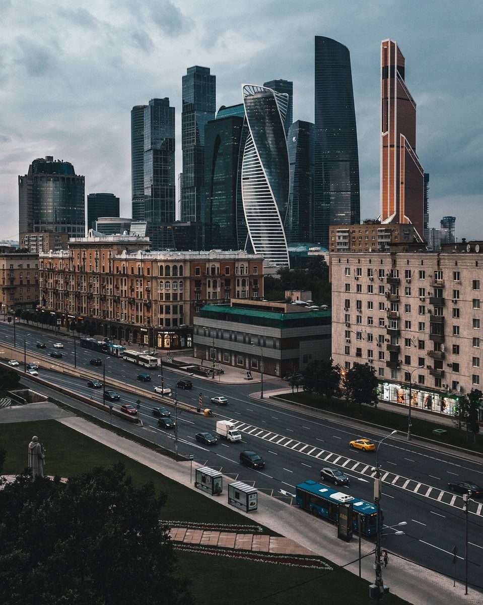 View of Moscow's modern skyscrapers and busy urban streets.