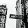 grayscale photo of 1-21 Wall street signage