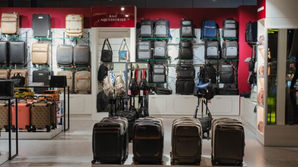 Elegant luggage display in a premium Doha airport shop, Qatar.