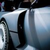 Sleek futuristic concept car showcased in Jakarta. Modern automotive design and innovation.