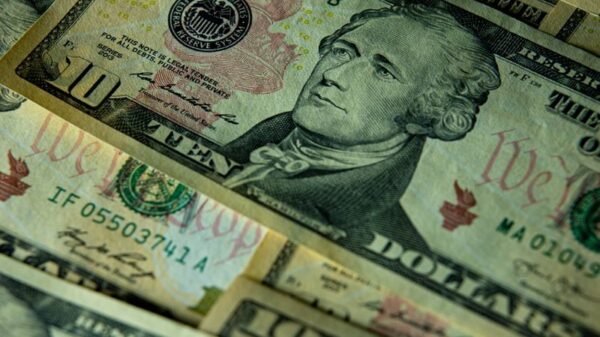 Detailed close-up of multiple US dollar bills highlighting financial themes.