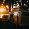 brown van under the tree during sunset