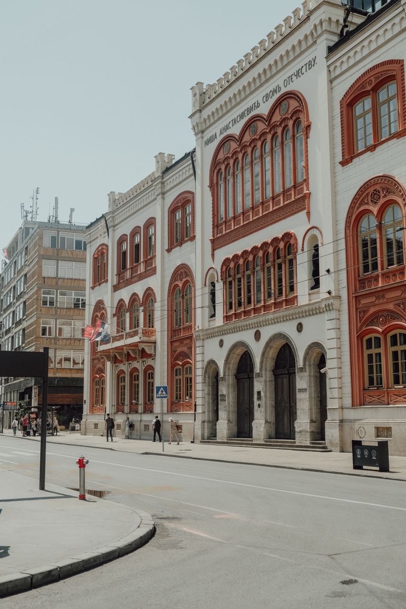 Elegant historic university facade in the urban streets of Belgrade, Serbia.