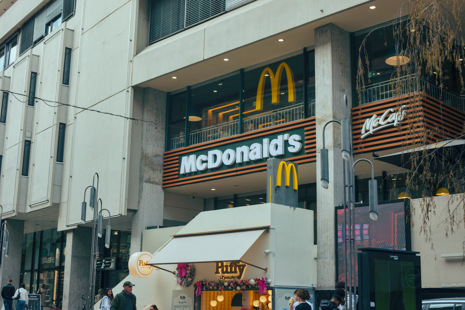 Street view of a modern McDonald's location in a busy urban area, Ljubljana, Slovenia.