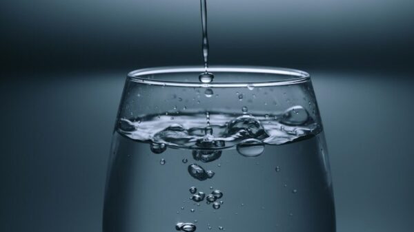 clear drinking glass on gray surface