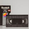 Retro VHS tape with original box, symbolizing 80s nostalgia and analog technology.