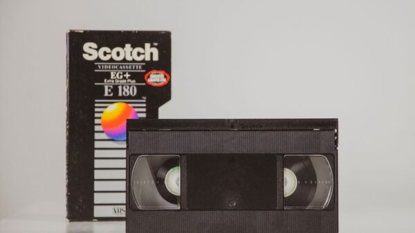 Retro VHS tape with original box, symbolizing 80s nostalgia and analog technology.