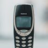 Retro Nokia 3310 cell phone shown in a classic front view, capturing its vintage charm.