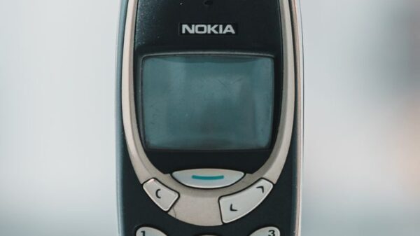 Retro Nokia 3310 cell phone shown in a classic front view, capturing its vintage charm.