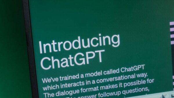 Laptop displaying ChatGPT introduction page on a web browser.