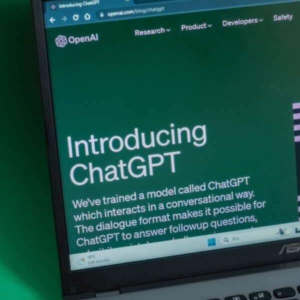Laptop displaying ChatGPT introduction page on a web browser.