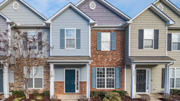 Elegant view of suburban townhouses showcasing diverse architectural styles.