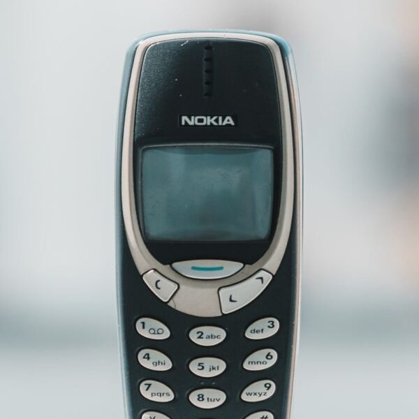 Retro Nokia 3310 cell phone shown in a classic front view, capturing its vintage charm.