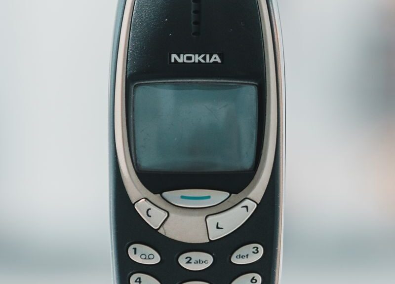 Retro Nokia 3310 cell phone shown in a classic front view, capturing its vintage charm.