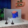 Creative modern art installation featuring a brain sculpture connected to joysticks.