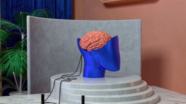Creative modern art installation featuring a brain sculpture connected to joysticks.